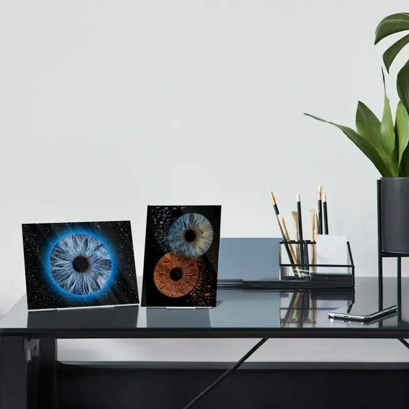 Freestanding acrylic iris photography stand on a desk