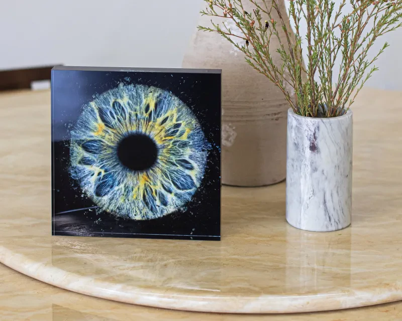 Solid freestanding acrylic block with iris photography artwork