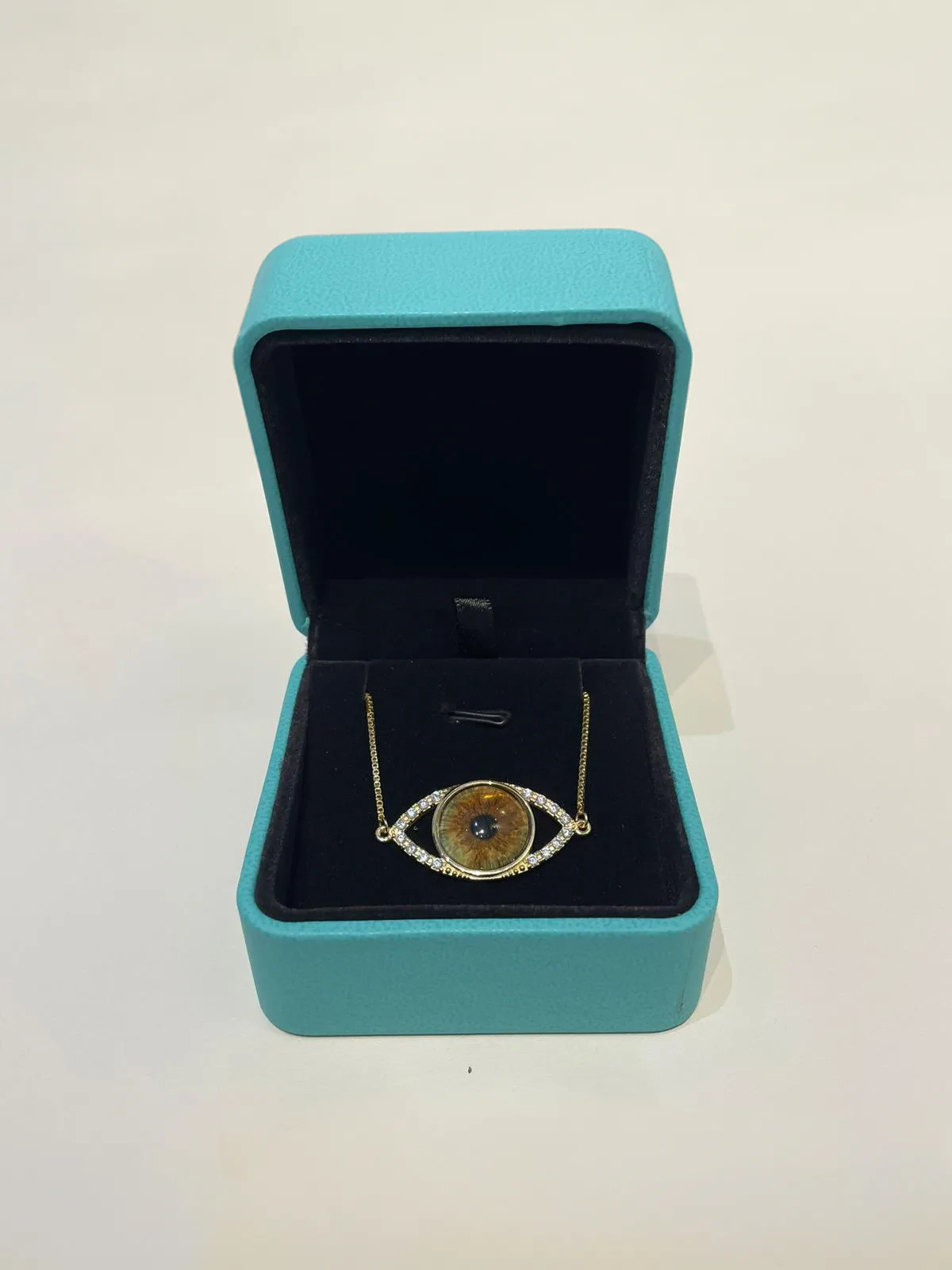 Handcrafted iris photography jewelry piece