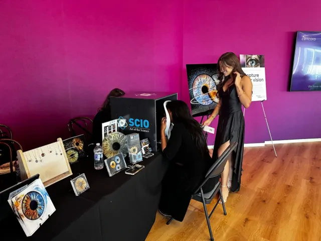 Personalized iris artwork presented at a special event
